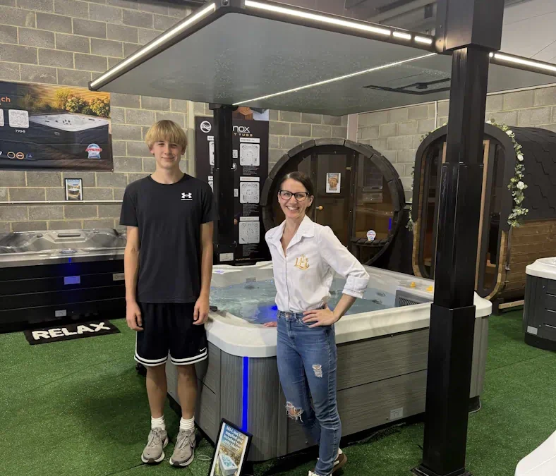 Supporting Young Local Talent in Shiremoor: Hayden Delivers Lust Hot Tubs Leaflets